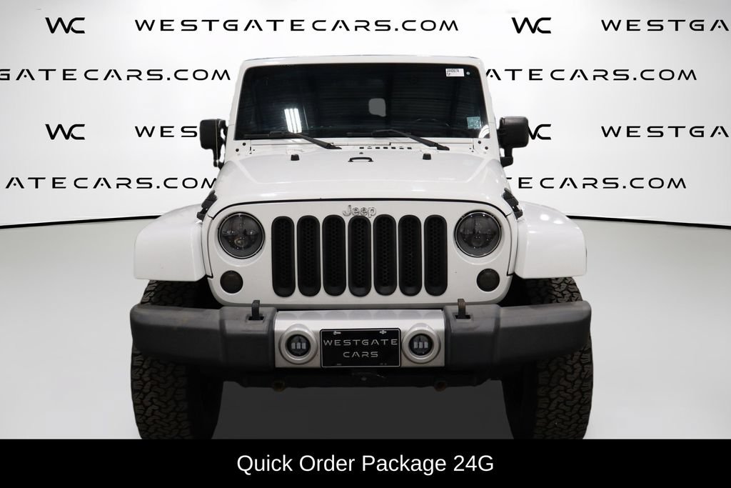 Used 2012 Jeep Wrangler Unlimited Sahara w/ Max Tow Pkg AWD/4WD image 2