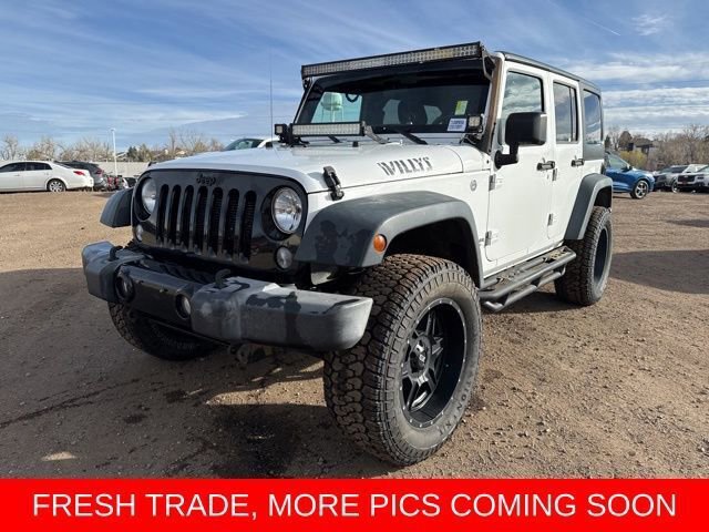 Used 2016 Jeep Wrangler Unlimited Sport image 1