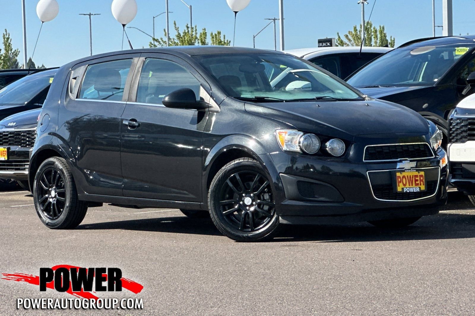Used 2014 Chevrolet Sonic LT w/ Fun and Sun Package FWD image 1