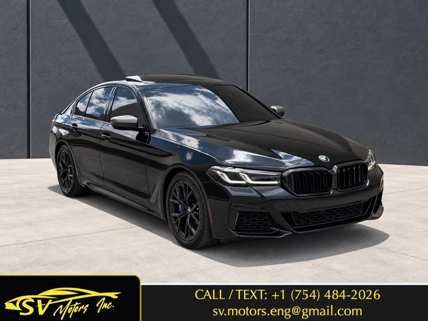 Used 2022 BMW M550i xDrive AWD/4WD image 1
