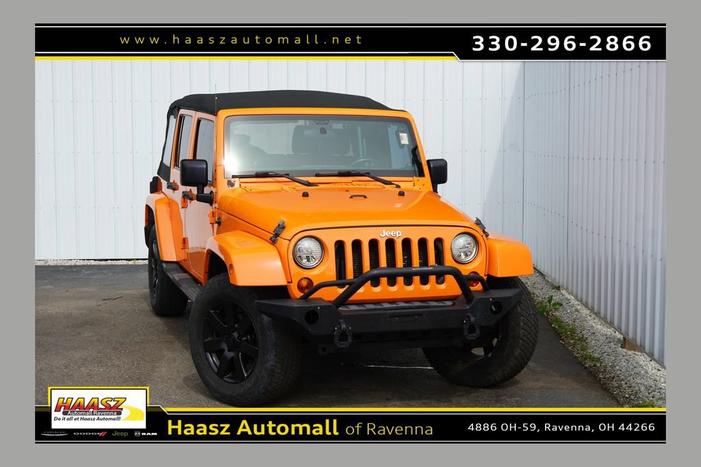 Used 2012 Jeep Wrangler Unlimited Sahara w/ Dual Top Group AWD/4WD image 1