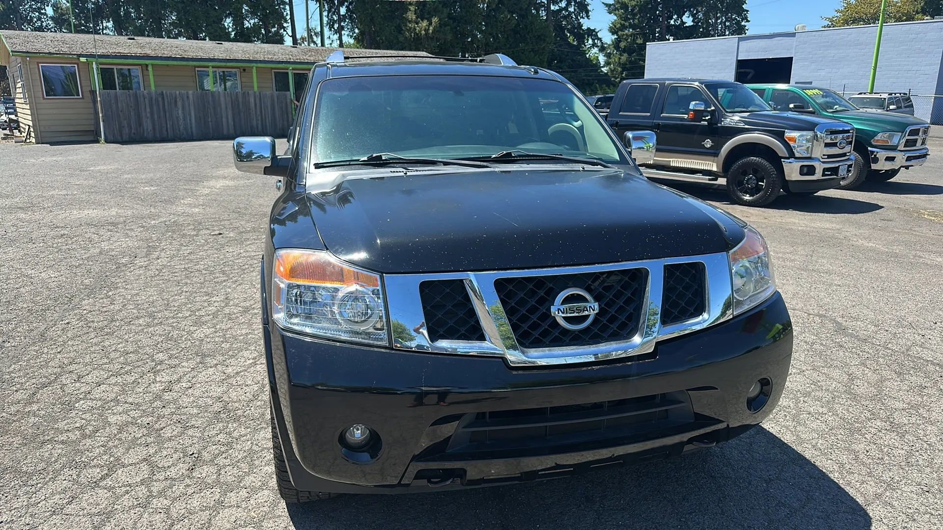 Used 2011 Nissan Armada SL w/ DVD FES Pkg image 1