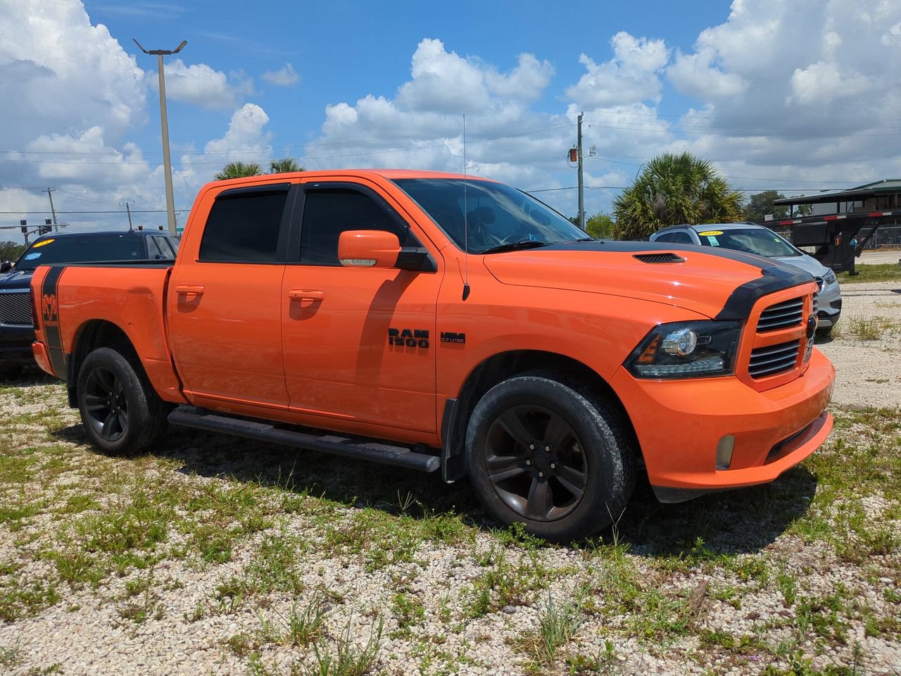 Used 2017 RAM 1500 Sport w/ Ignition Orange Sport Package AWD/4WD image 2