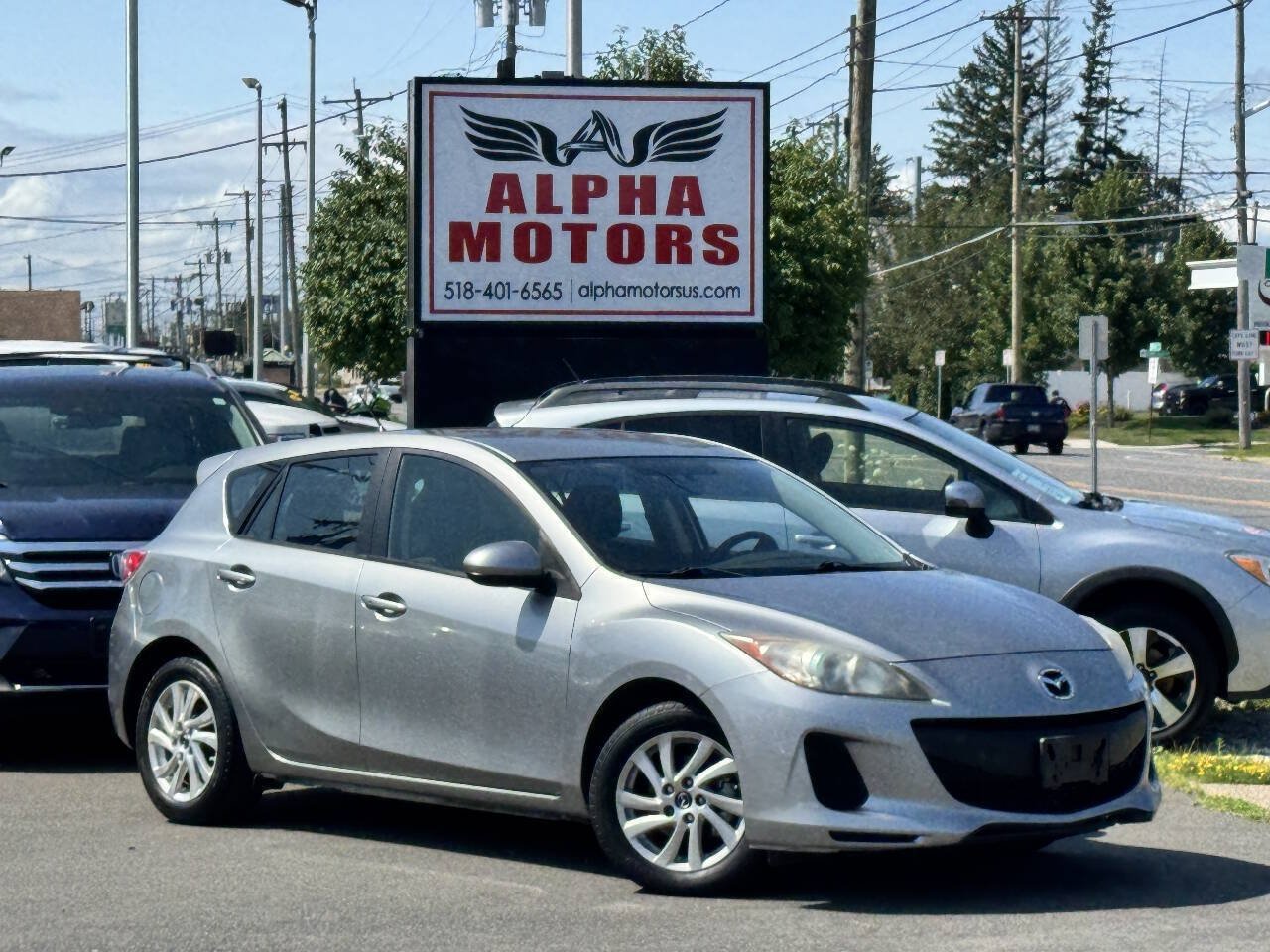 Used 2013 MAZDA MAZDA3 i Touring FWD image 1