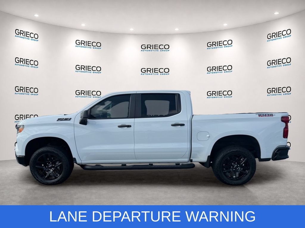 Certified 2024 Chevrolet Silverado 1500 Custom Trail Boss w/ Turbomax Blackout Package AWD/4WD image 4