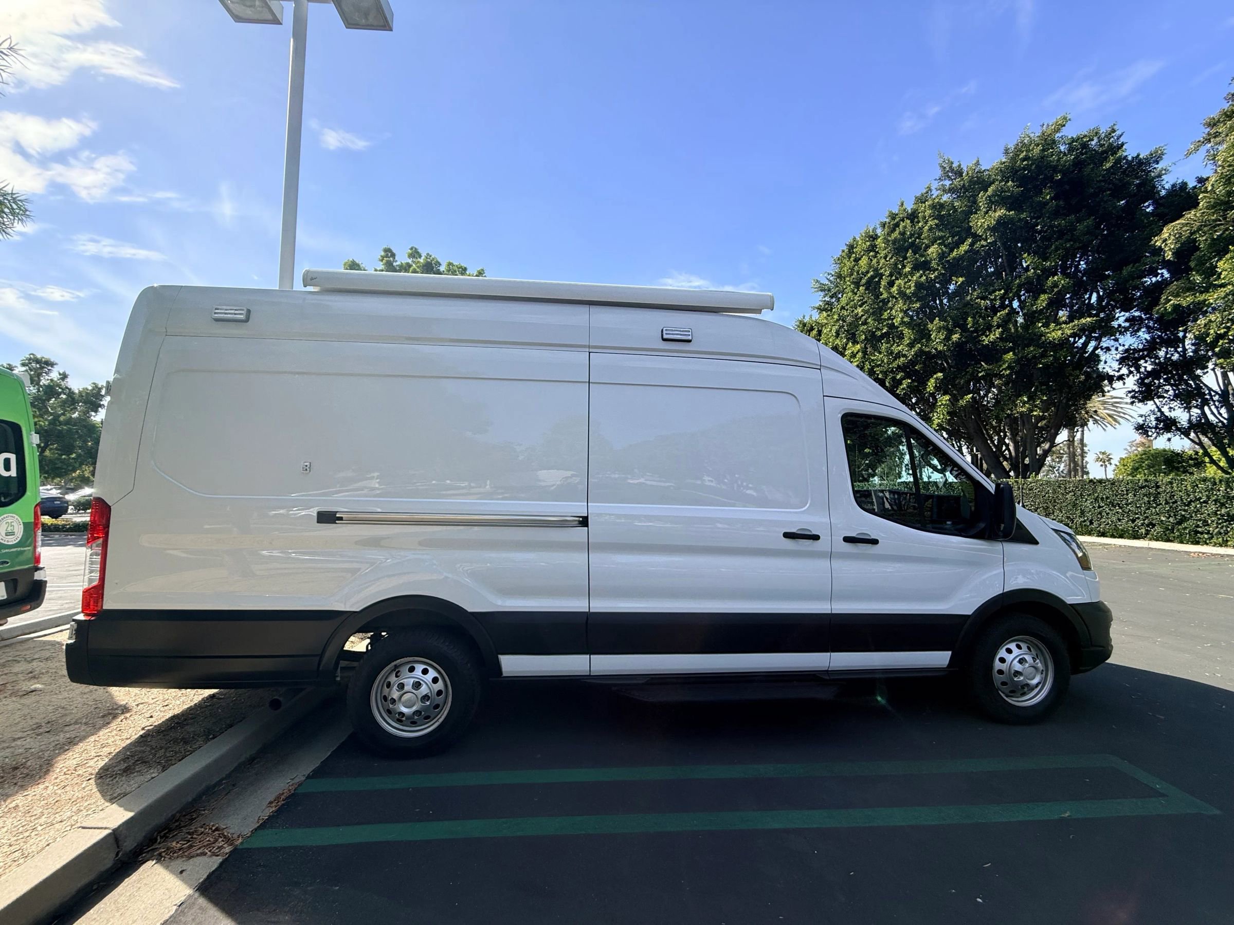 Used 2022 Ford Transit 350 148 High Roof Extended AWD w/ Load Area Protection Package image 8