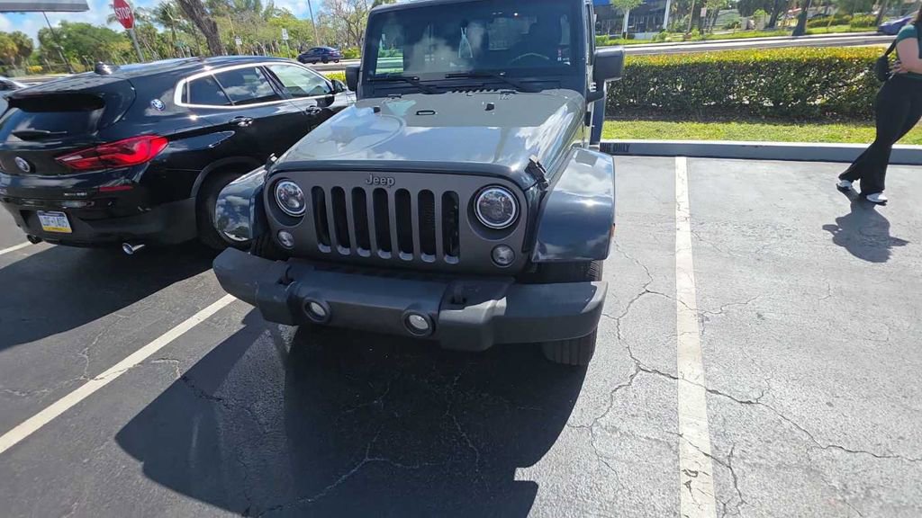 Used 2017 Jeep Wrangler Unlimited Sport image 1