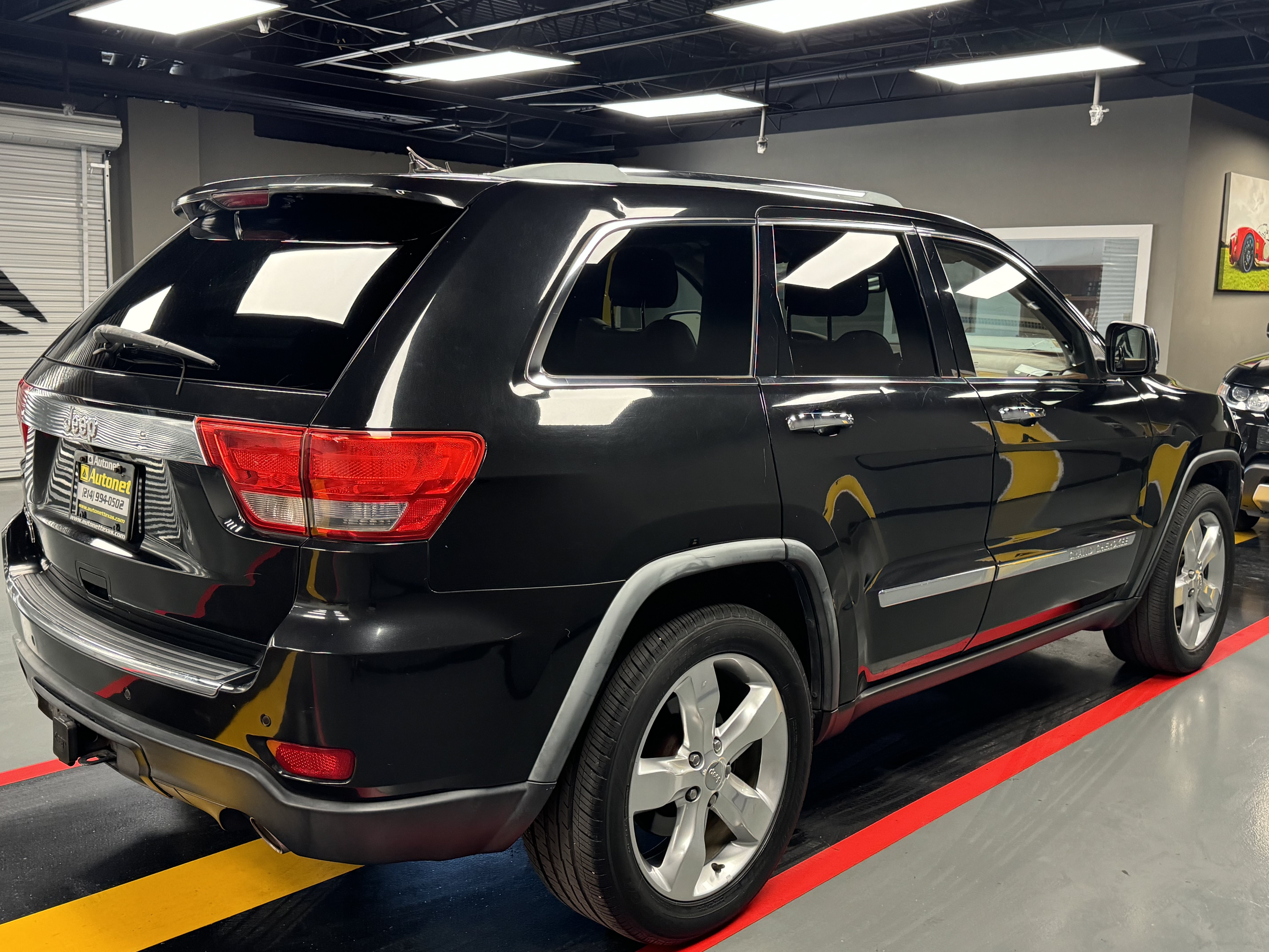 Used 2011 Jeep Grand Cherokee Overland Summit AWD/4WD image 6