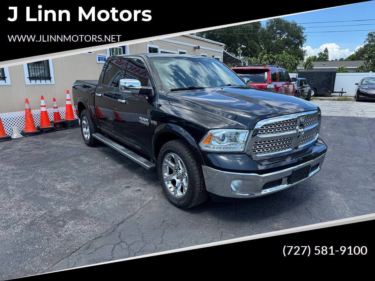 Used 2018 RAM 1500 Laramie AWD/4WD image 1