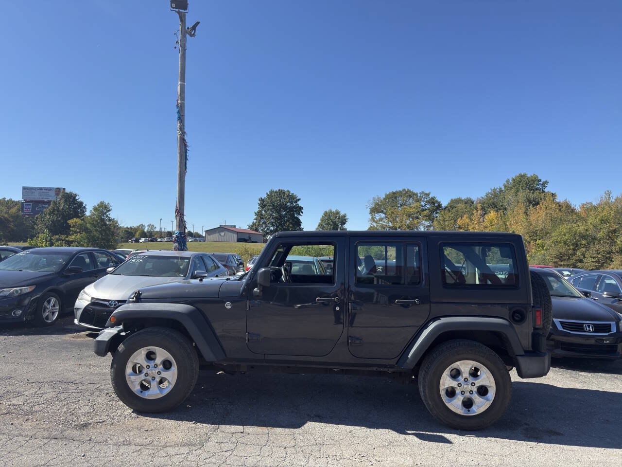 Used 2016 Jeep Wrangler Unlimited Sport w/ Max Tow Package AWD/4WD image 3