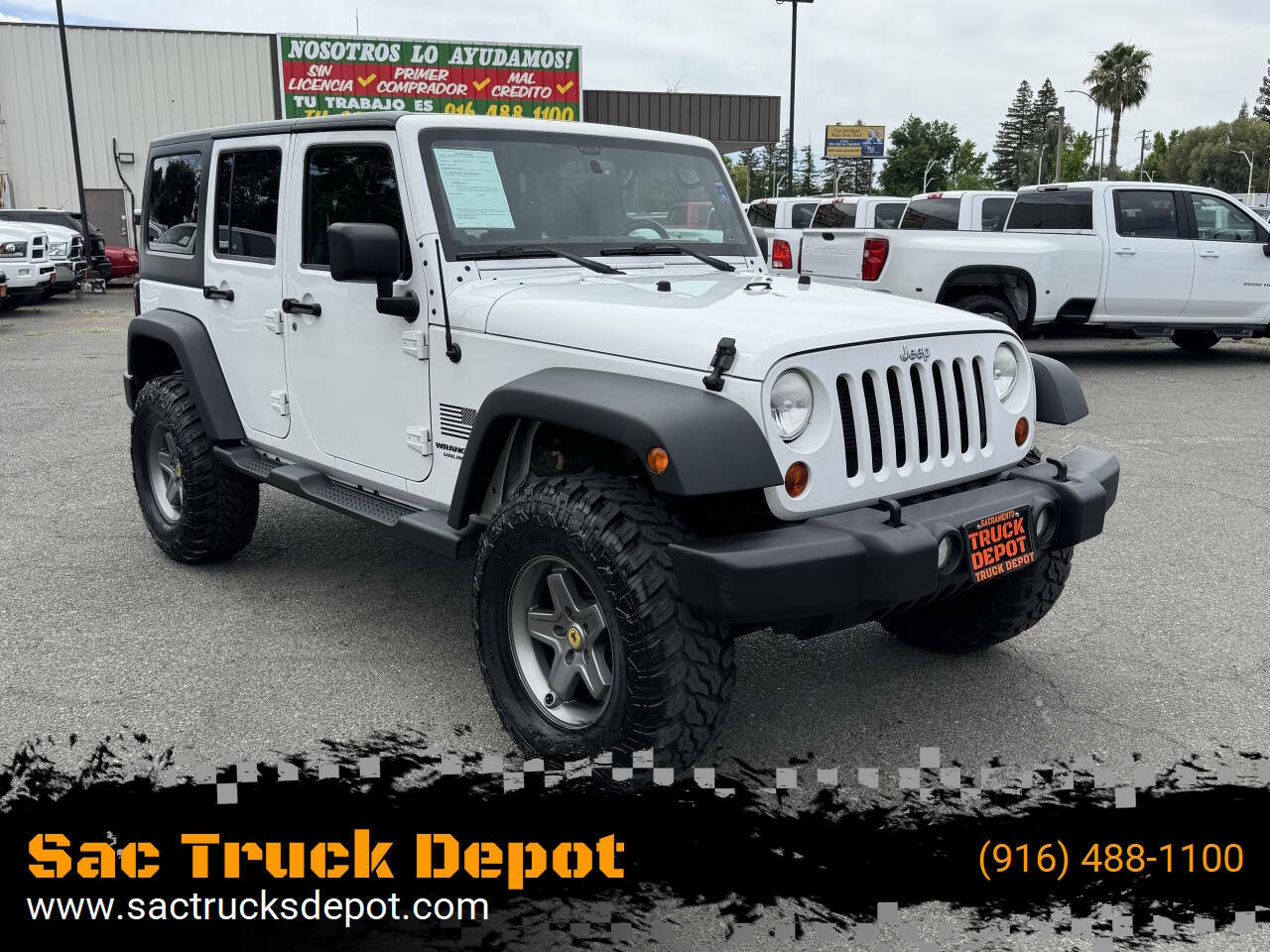 Used 2013 Jeep Wrangler Unlimited Sport AWD/4WD image 1