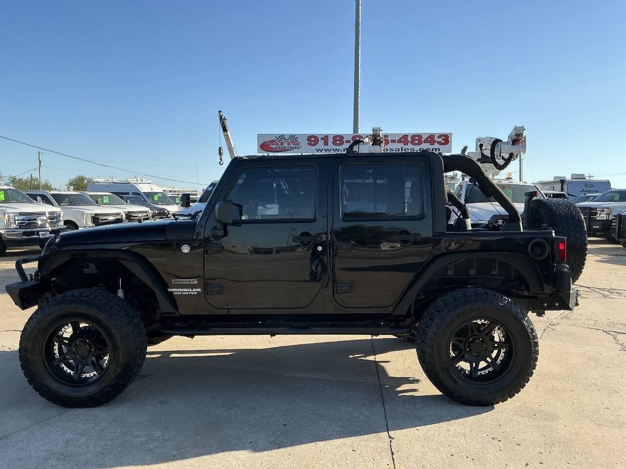 Used 2013 Jeep Wrangler Unlimited Sport w/ Trailer Tow Group AWD/4WD image 2