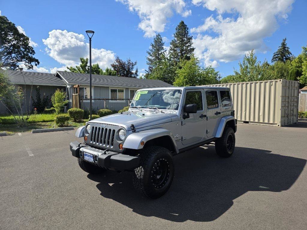 Used 2013 Jeep Wrangler Unlimited Sport AWD/4WD image 1