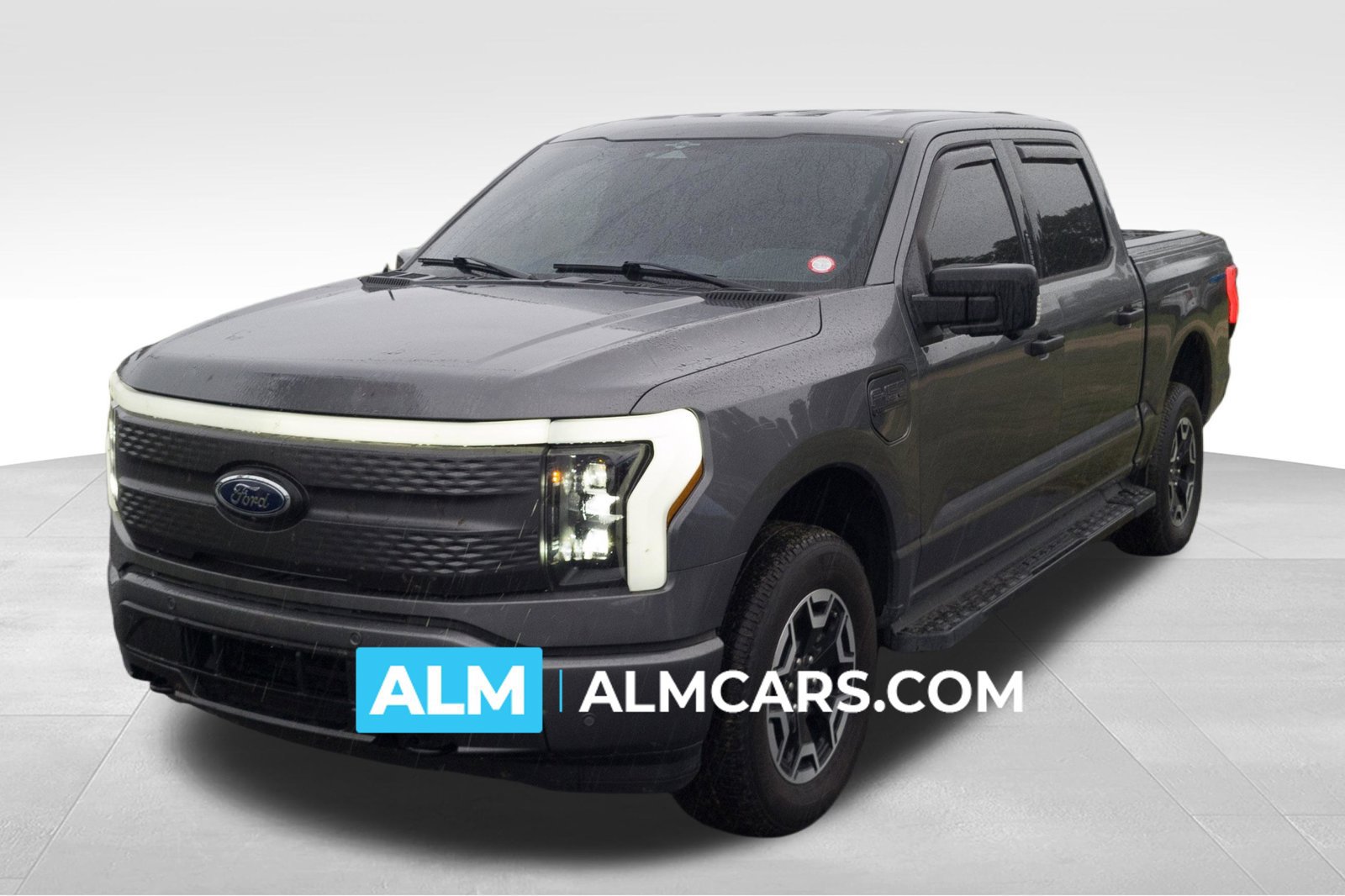 Used 2023 Ford F150 Lightning XLT AWD/4WD image 1