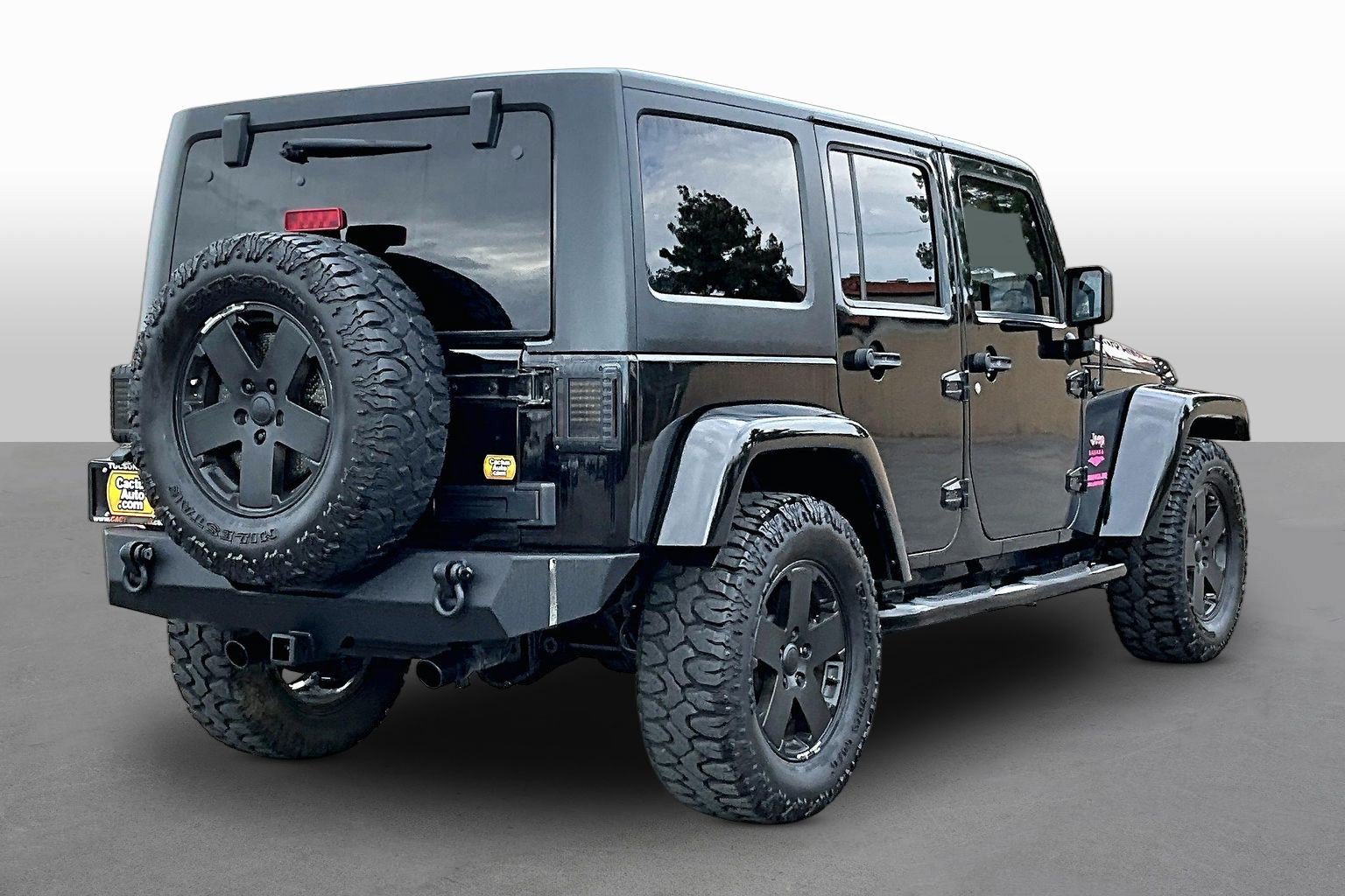Used 2012 Jeep Wrangler Unlimited Sahara w/ Dual Top Group AWD/4WD image 2