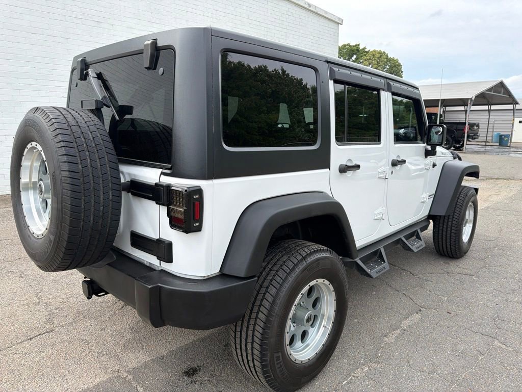 Used 2011 Jeep Wrangler Unlimited Rubicon w/ Dual Top Group AWD/4WD image 2