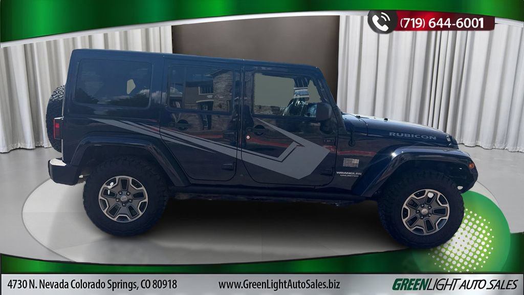Used 2013 Jeep Wrangler Unlimited Rubicon w/ Dual Top Group AWD/4WD image 6