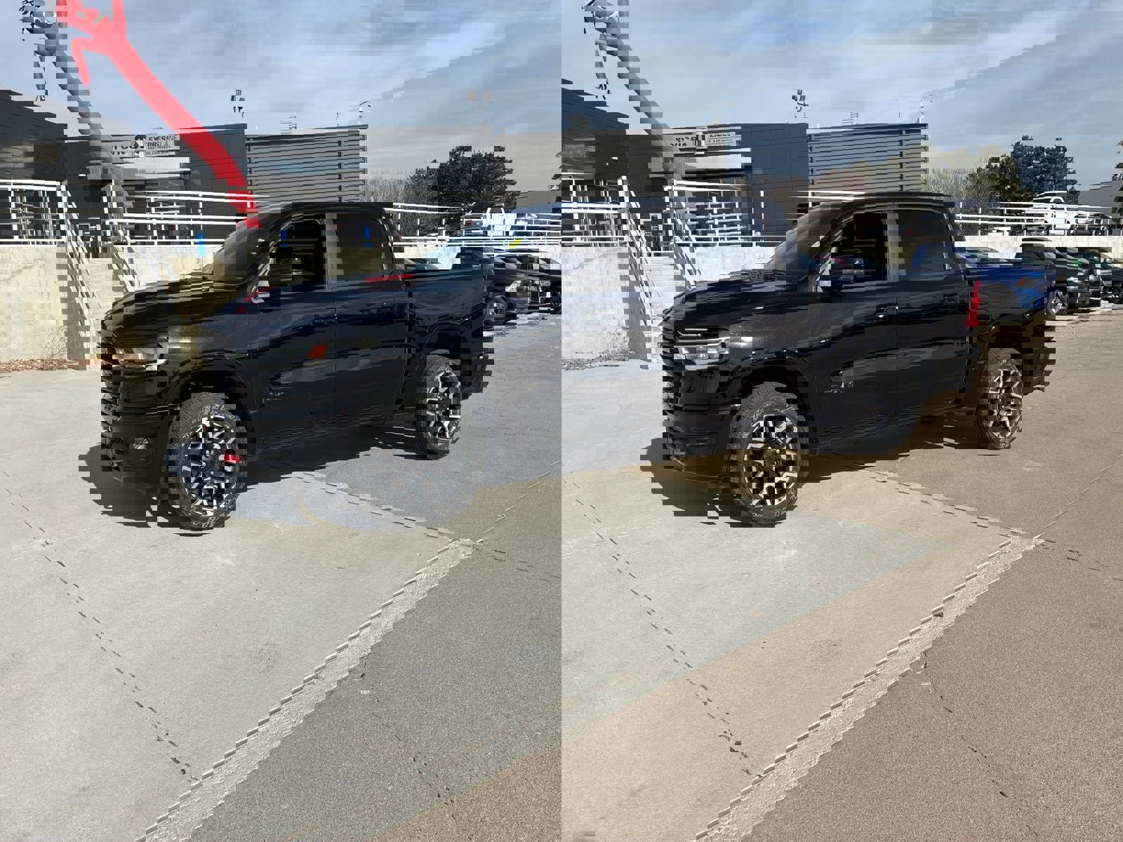 Used 2025 RAM 1500 Laramie w/ Sport Appearance Package image 1