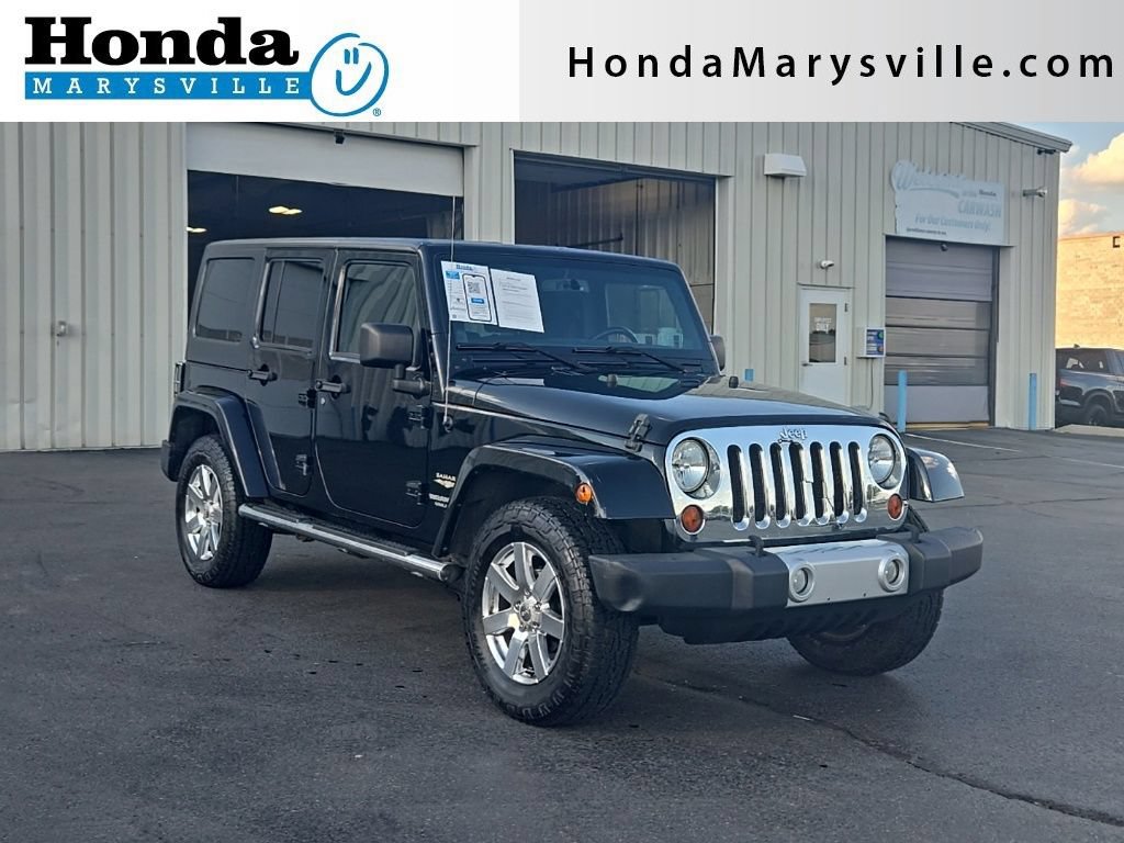 Used 2013 Jeep Wrangler Unlimited Sahara w/ Dual Top Group AWD/4WD video 1