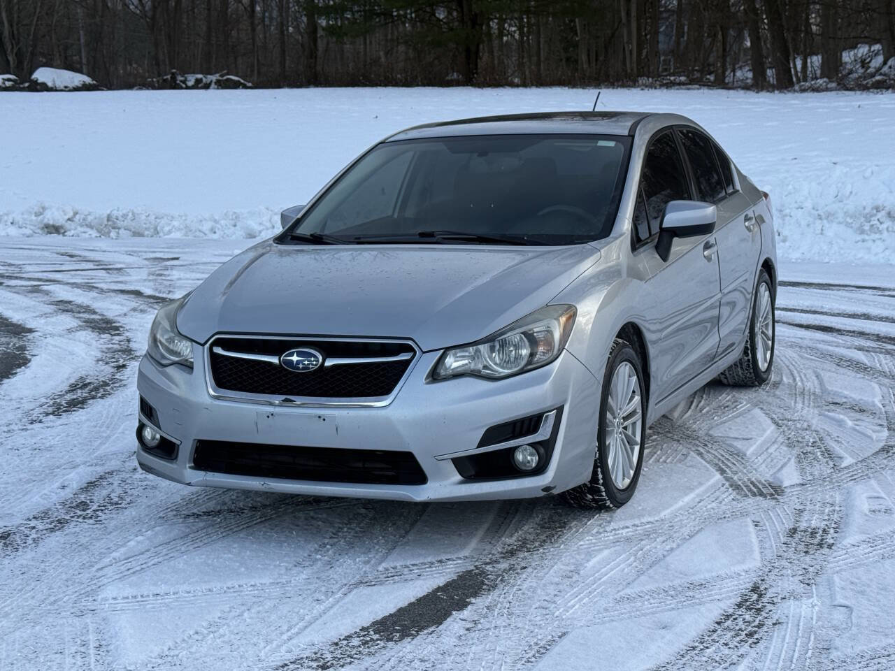 Used 2016 Subaru Impreza 2.0i Premium AWD/4WD image 1