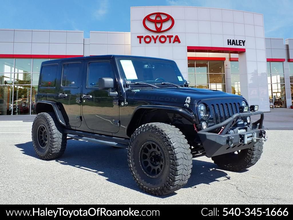 Used 2014 Jeep Wrangler Unlimited Rubicon w/ Connectivity Group AWD/4WD image 1