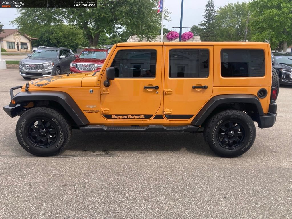 Used 2012 Jeep Wrangler Unlimited Sahara w/ Dual Top Group AWD/4WD image 8