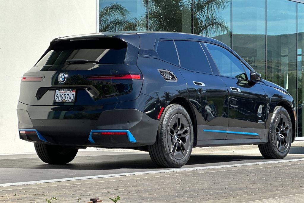 Used 2023 BMW iX xDrive50 w/ BMW I Signature Blue Package AWD/4WD image 3