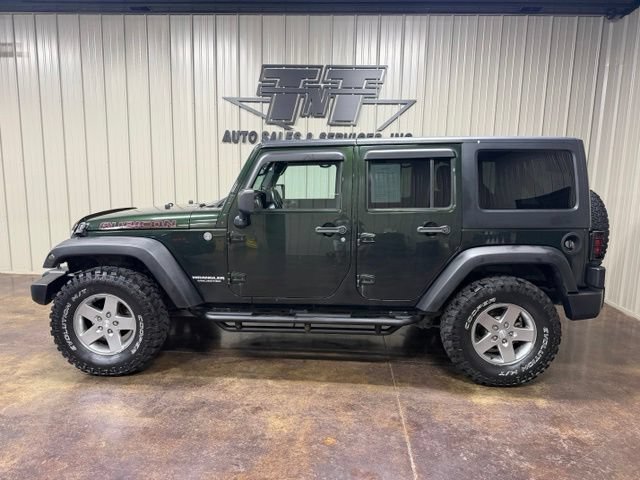 Used 2012 Jeep Wrangler Unlimited Rubicon w/ Dual Top Group AWD/4WD image 3