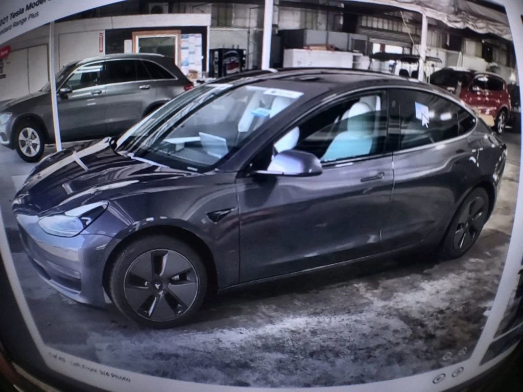 Used 2021 Tesla Model 3 Standard Range Plus video 1