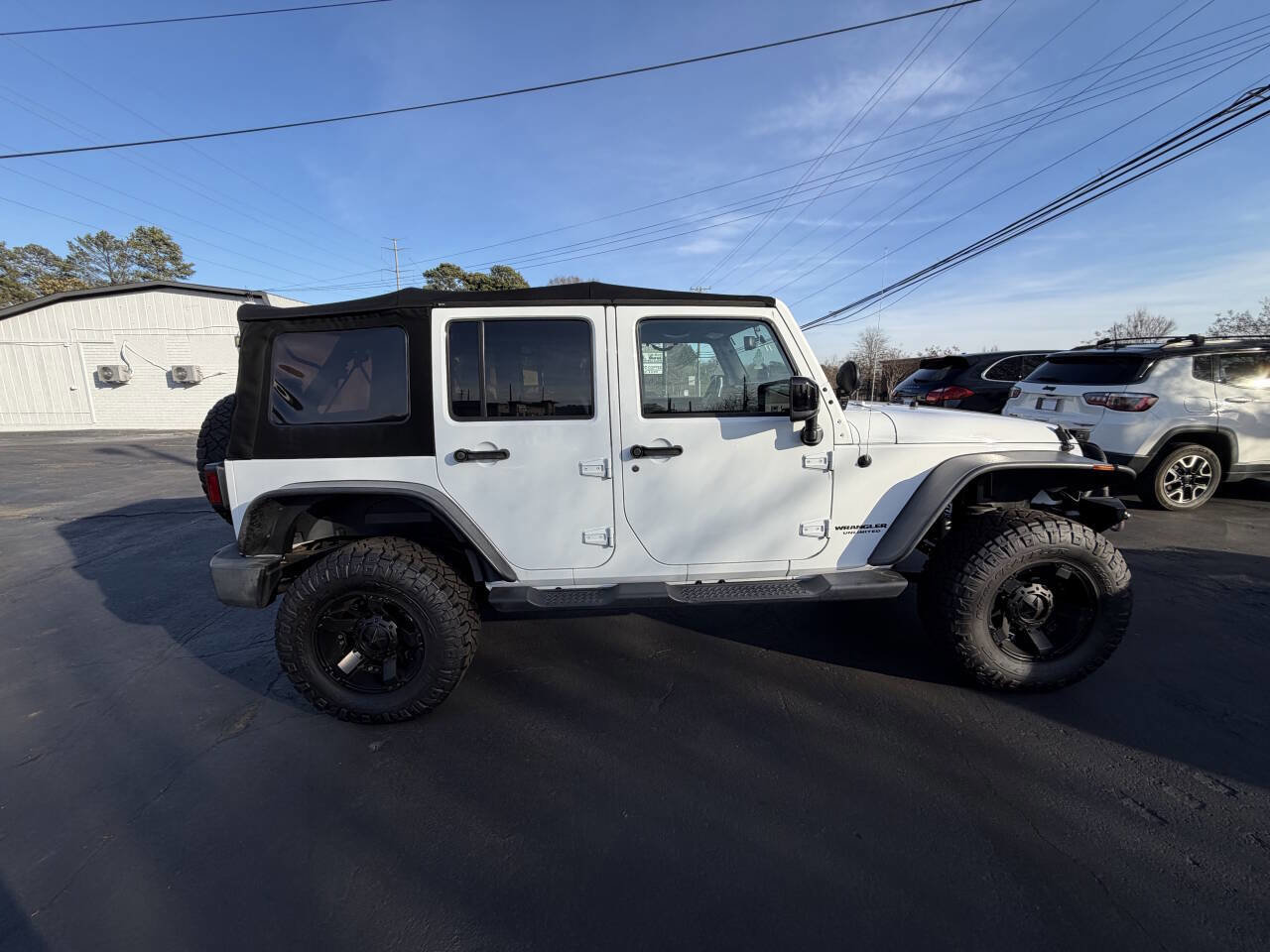 Used 2014 Jeep Wrangler Unlimited Sahara AWD/4WD image 4