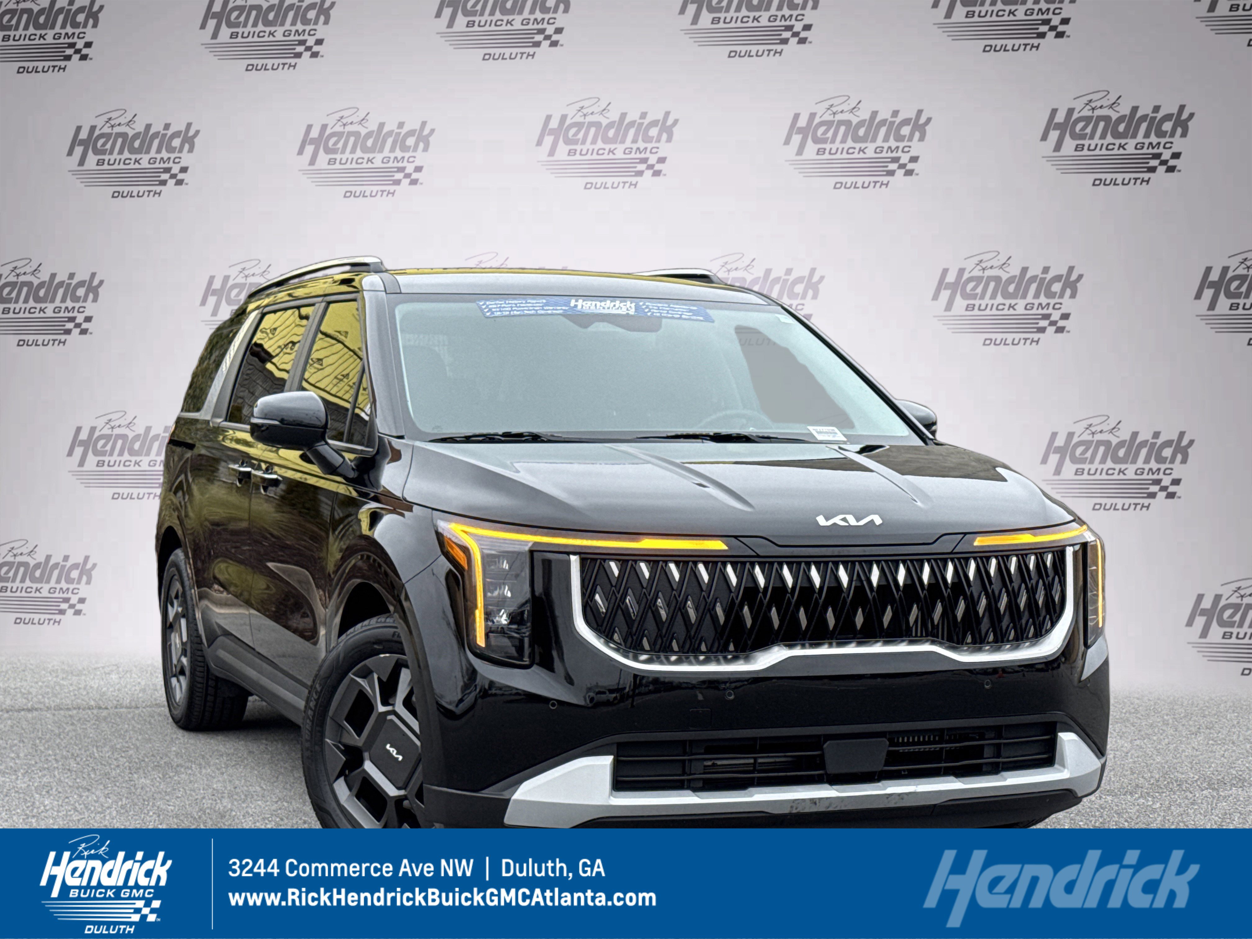 Used 2025 Kia Carnival EX image 1