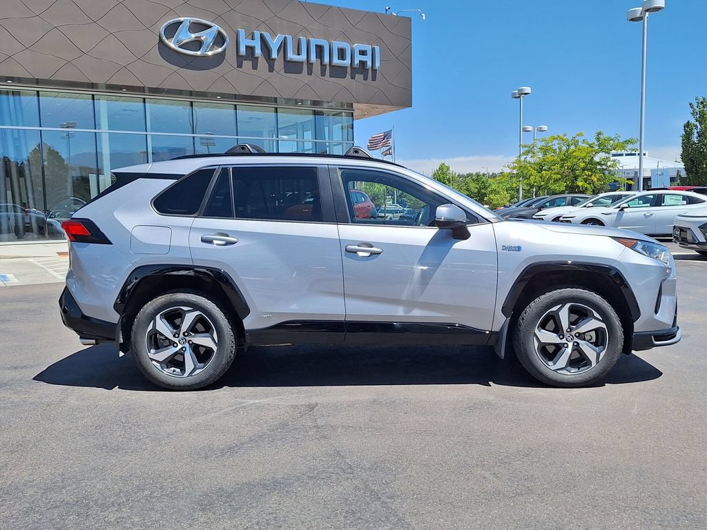 Used 2021 Toyota RAV4 SE w/ Weather & Moonroof Package AWD/4WD image 2