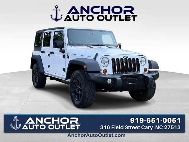 Used 2013 Jeep Wrangler Unlimited Sahara AWD/4WD image 1