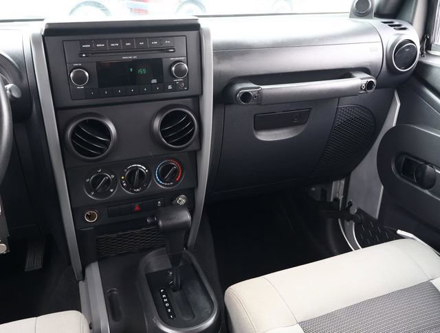 Used 2010 Jeep Wrangler Unlimited Sport w/ Black Appearance Group image 11