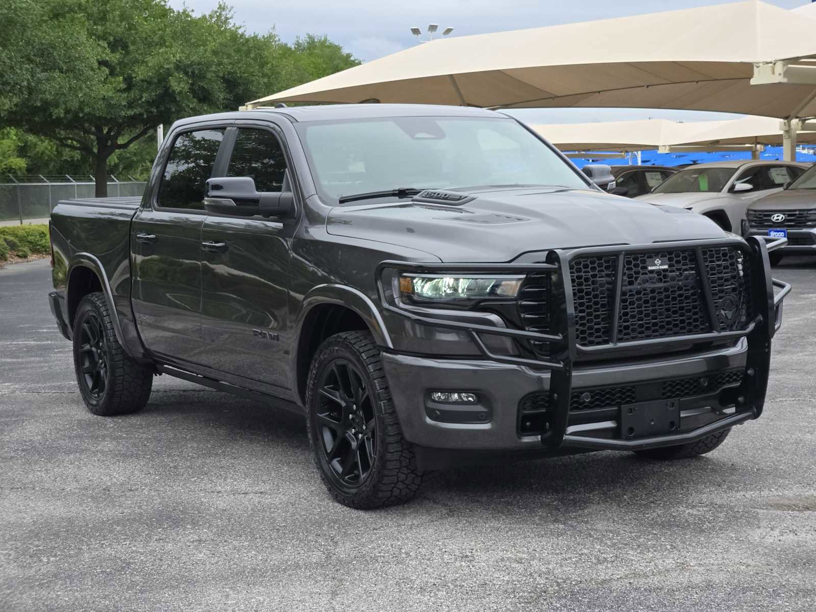 Used 2025 RAM 1500 Laramie w/ Night Edition AWD/4WD image 3