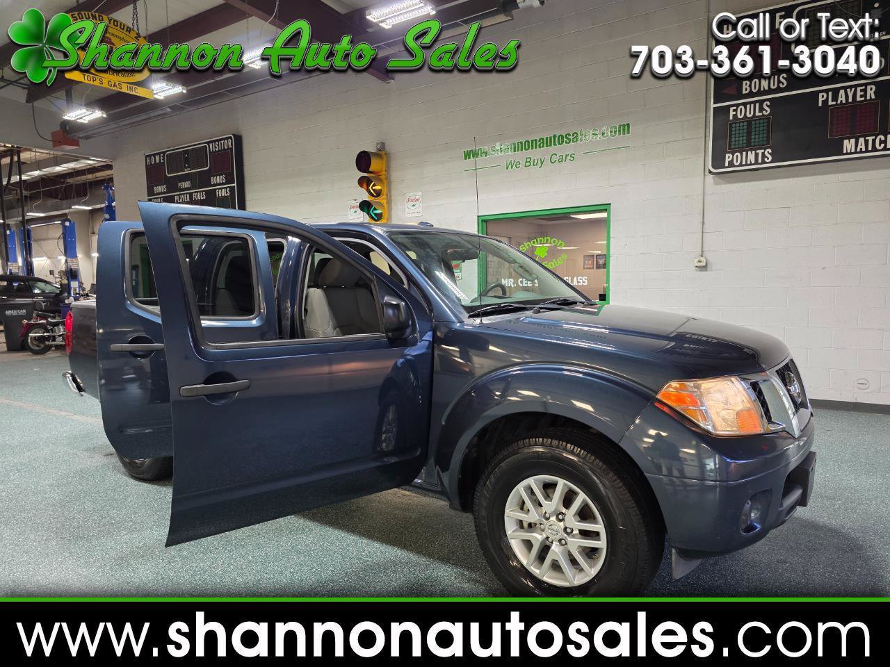 Used 2015 Nissan Frontier SV RWD image 1