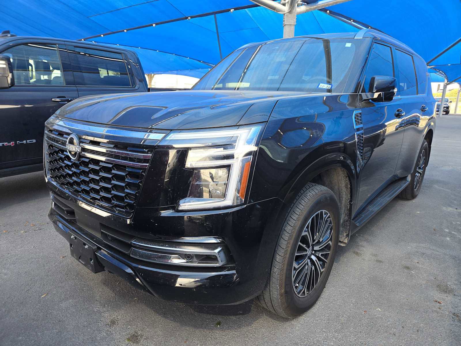 Used 2025 Nissan Armada SL w/ Captain's Chari Seat Package image 1