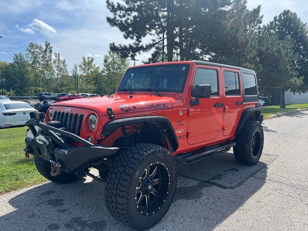 Used 2015 Jeep Wrangler Unlimited Sahara w/ Dual Top Group AWD/4WD image 1