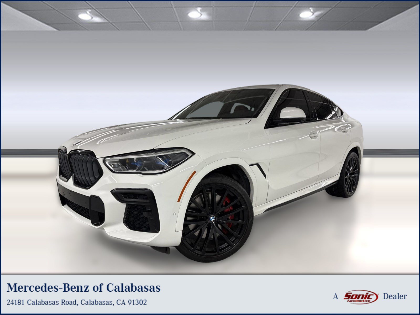 Used 2022 BMW X6 M50i w/ Executive Package AWD/4WD image 1