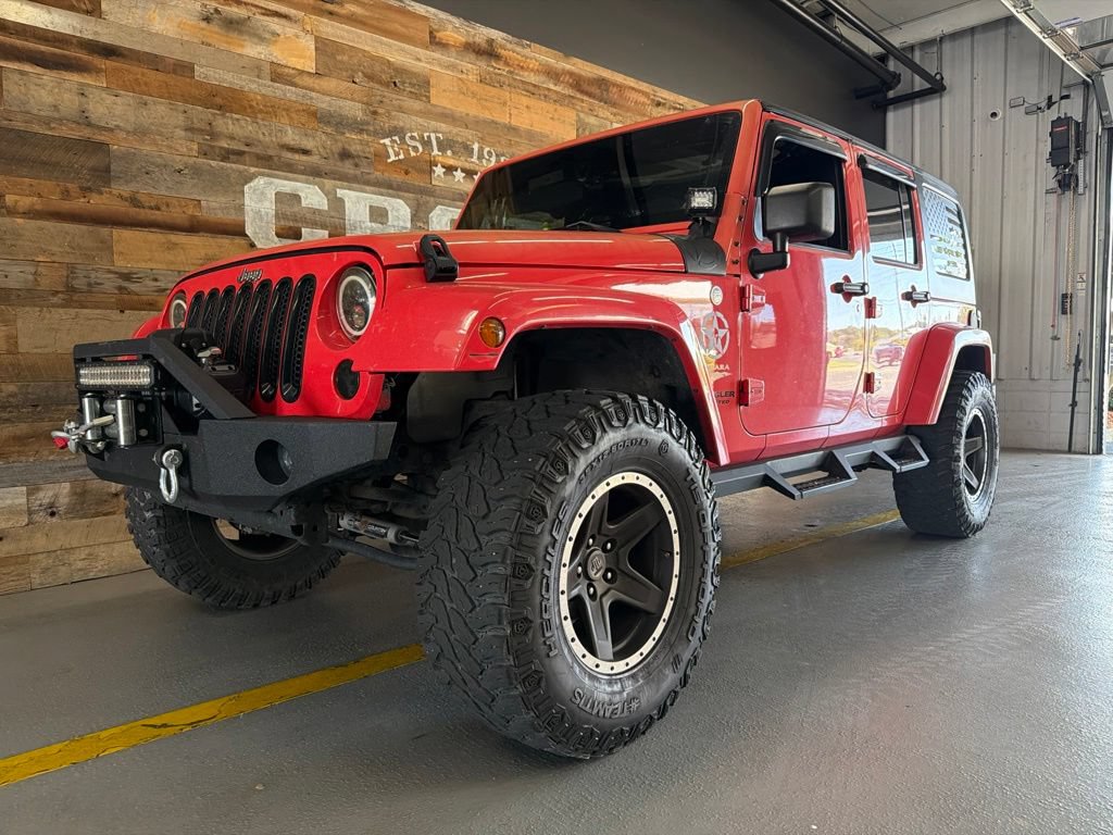 Used 2013 Jeep Wrangler Unlimited Sahara w/ Dual Top Group AWD/4WD image 2