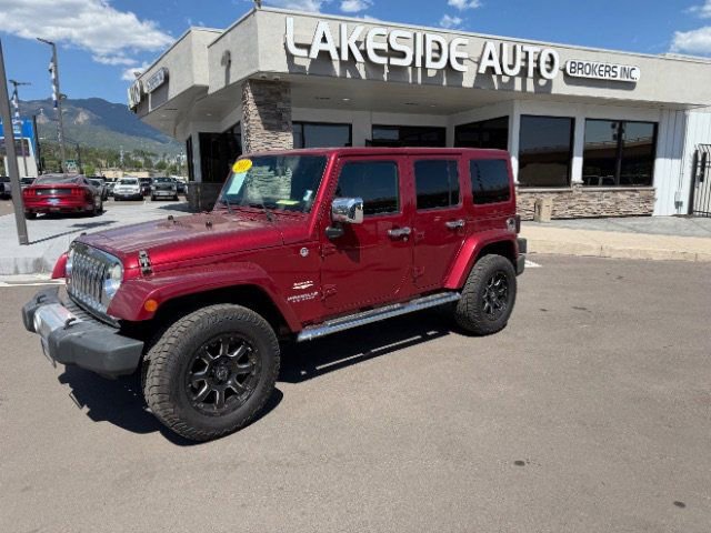 Used 2011 Jeep Wrangler Unlimited Sahara w/ Dual Top Group AWD/4WD image 2