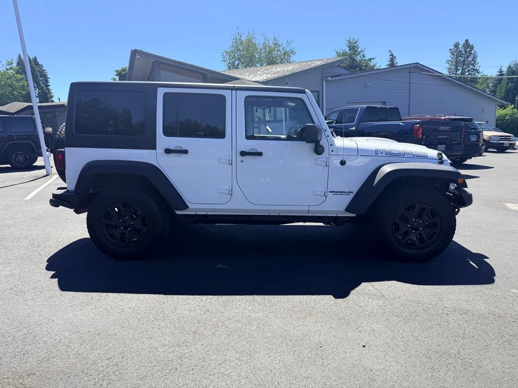 Used 2013 Jeep Wrangler Unlimited Sahara w/ Dual Top Group AWD/4WD image 6