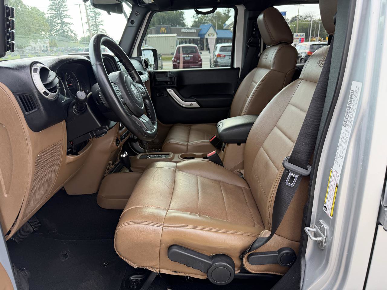 Used 2012 Jeep Wrangler Unlimited Sahara w/ Dual Top Group AWD/4WD image 12
