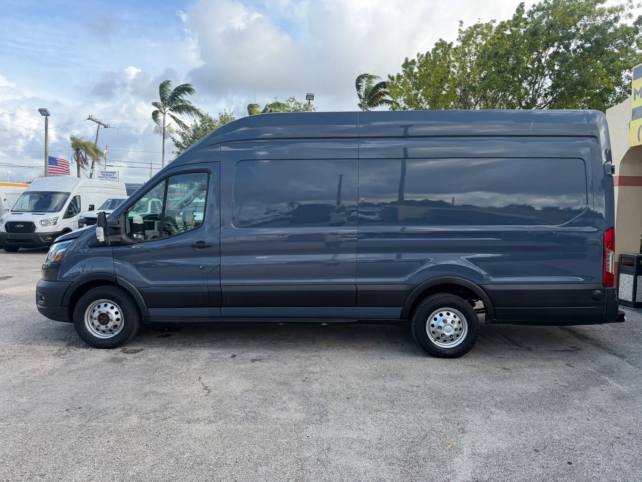 Used 2023 Ford Transit 250 148 High Roof Extended AWD w/ Parcel Delivery Package image 2