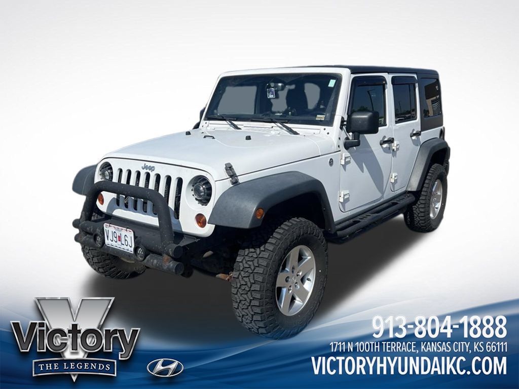 Used 2013 Jeep Wrangler Unlimited Sport