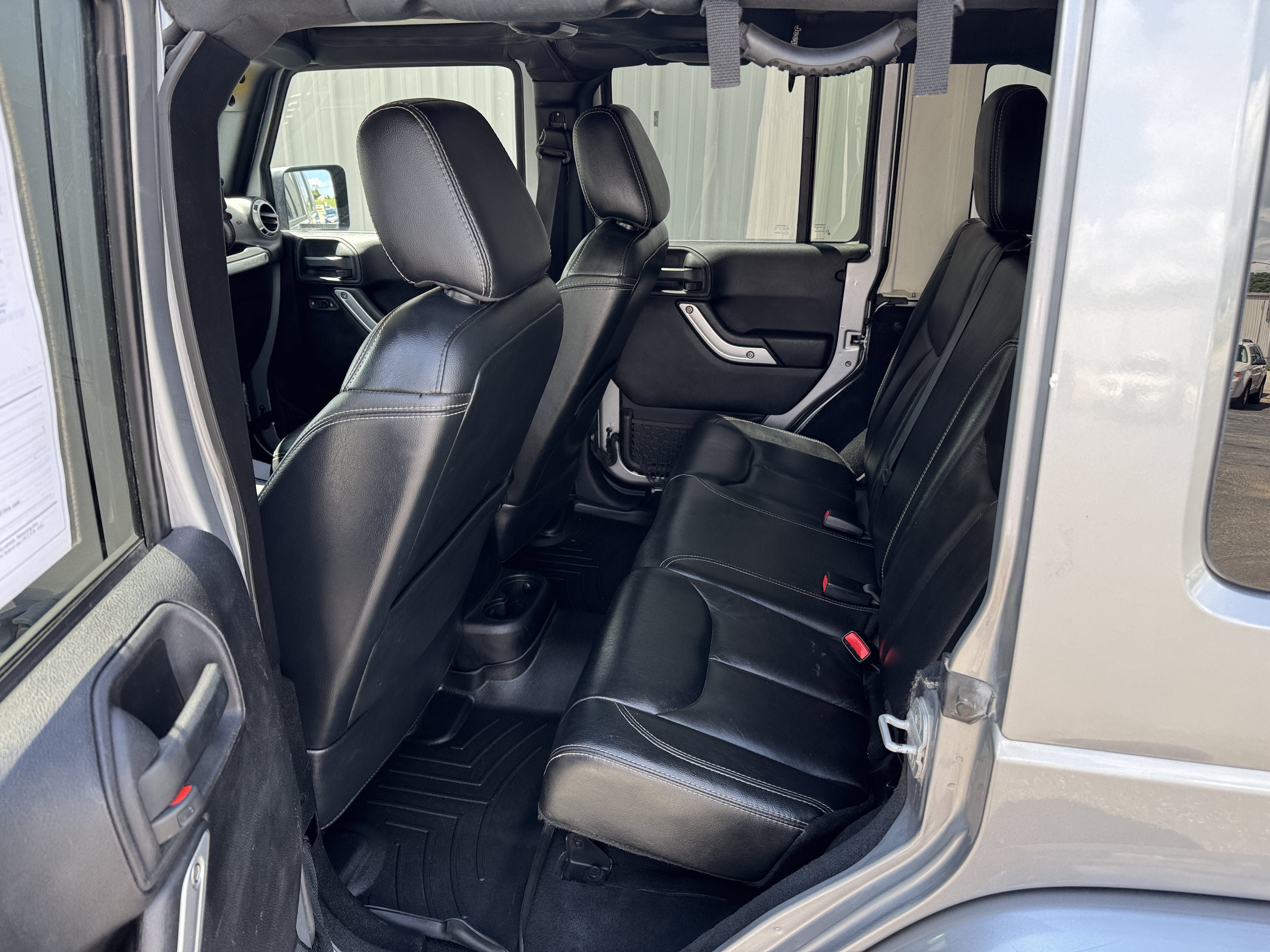 Used 2013 Jeep Wrangler Unlimited Sahara w/ Dual Top Group AWD/4WD image 25