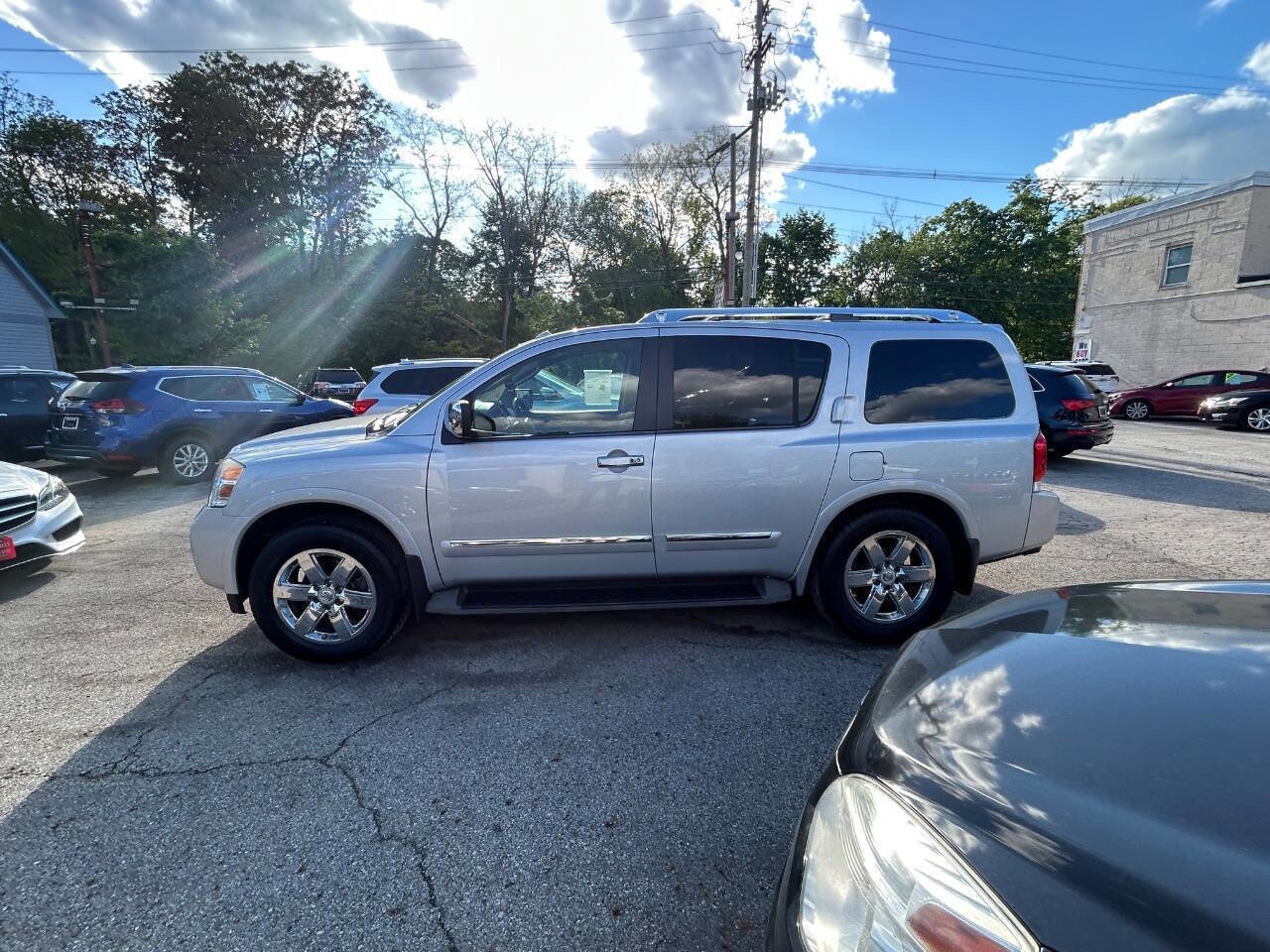 Used 2011 Nissan Armada Platinum w/ 2nd Row Captain Seat Pkg AWD/4WD image 4