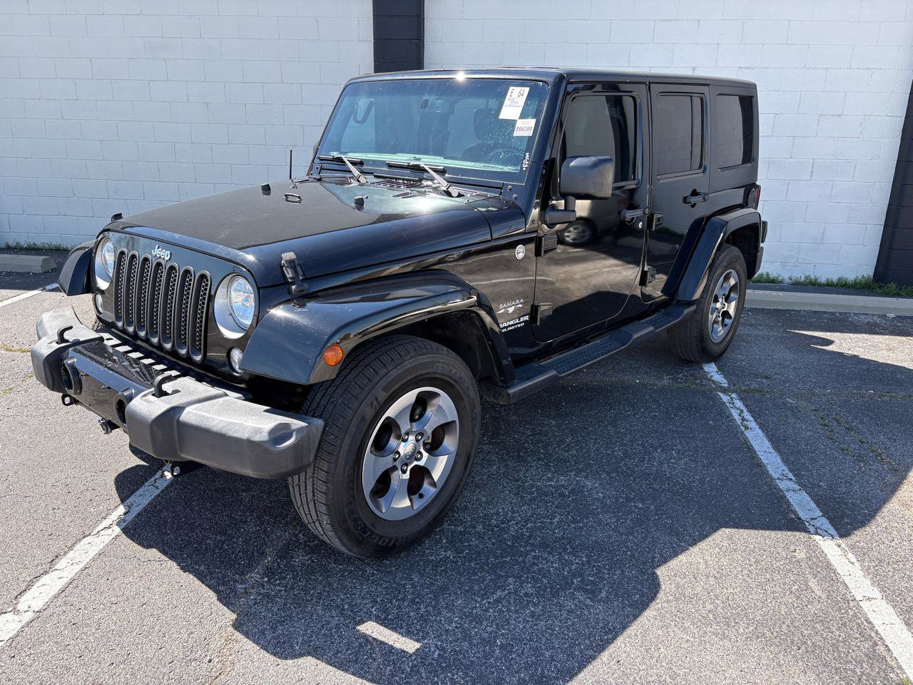 Used 2016 Jeep Wrangler Unlimited Sahara image 1