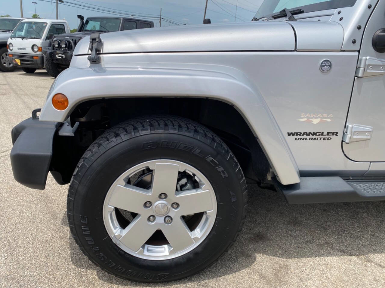Used 2012 Jeep Wrangler Unlimited Sahara w/ Dual Top Group AWD/4WD image 56