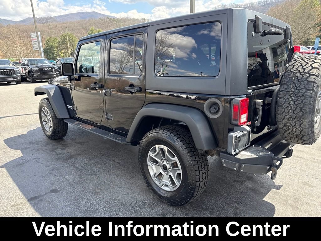 Used 2012 Jeep Wrangler Unlimited Rubicon w/ Dual Top Group image 8